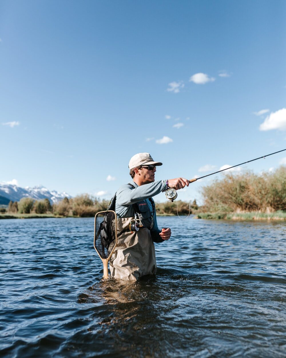 Fisherman in lake
