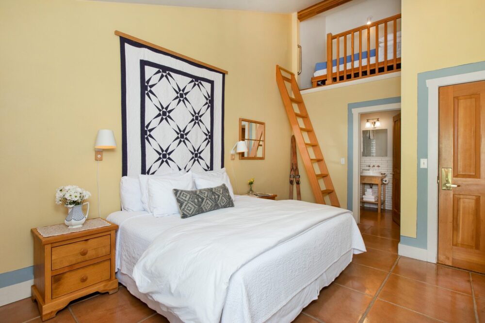 queen bed and loft bed room